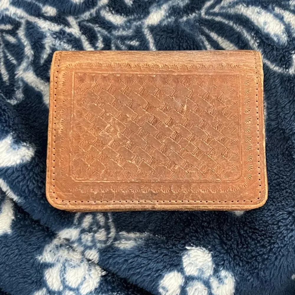 1898 Antique hand-tooled Leather billfold wallet featuring a floral pattern